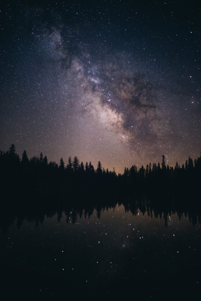 stars on mountain lake