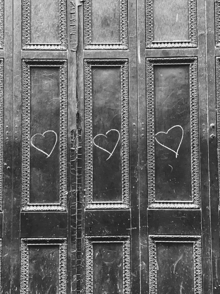 hearts drawn on city door