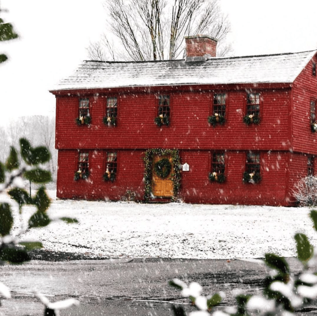 red barn with wreath