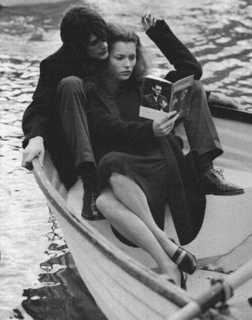 kate moss reading in boat