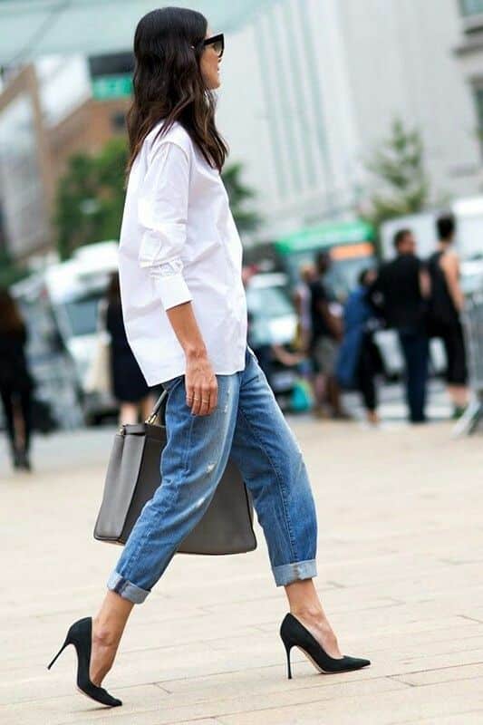 jeans and white button down on woman street style