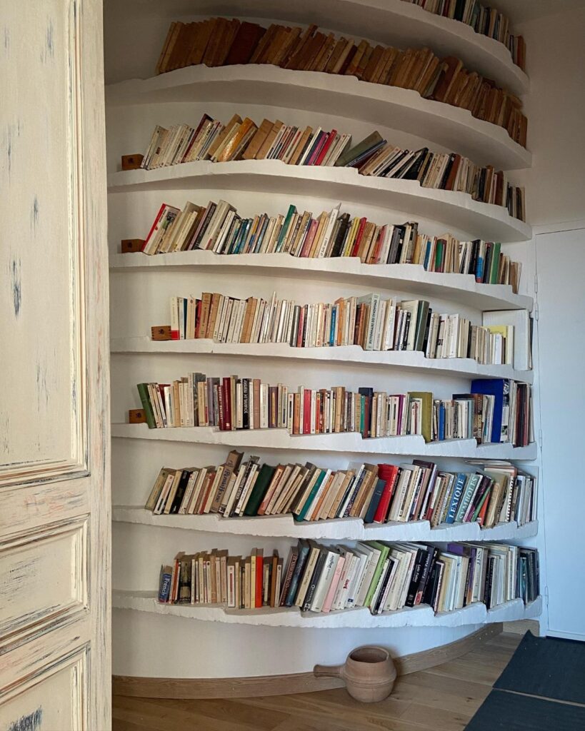 bookshelves with slanted books