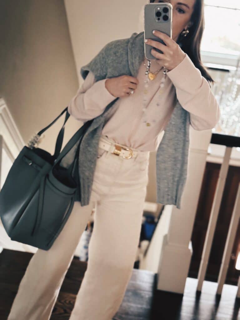 pastel sweater outfit idea for spring - pink sweater with white jeans