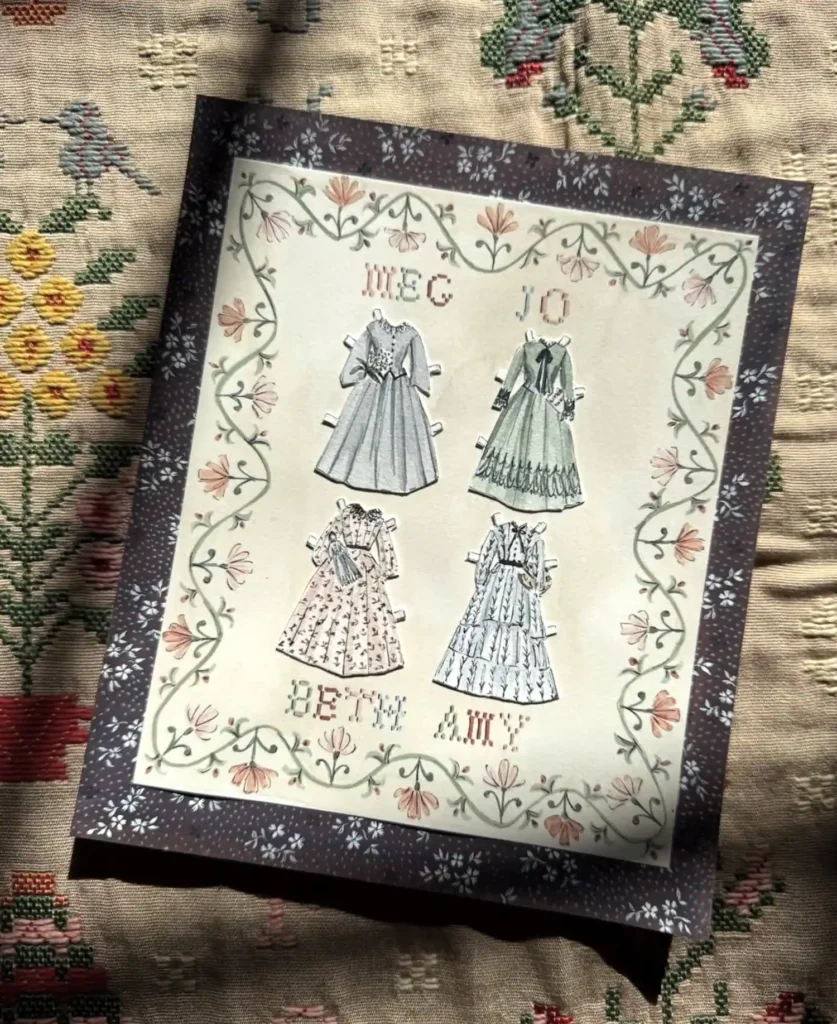 Illustrated “Little Women” print by artist Riley Sheehey featuring paper-doll dresses labeled Meg, Jo, Beth, and Amy