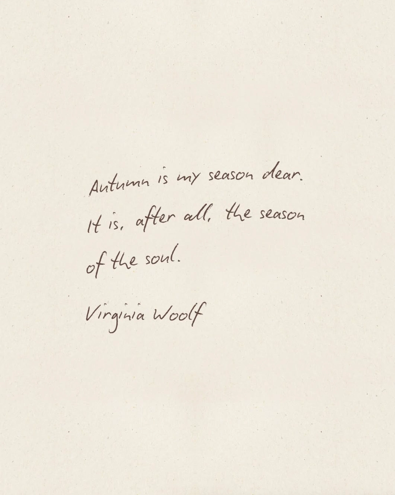 Handwritten quote on a cream paper background reading, “Autumn is my season dear. It is, after all, the season of the soul.” — Virginia Woolf.