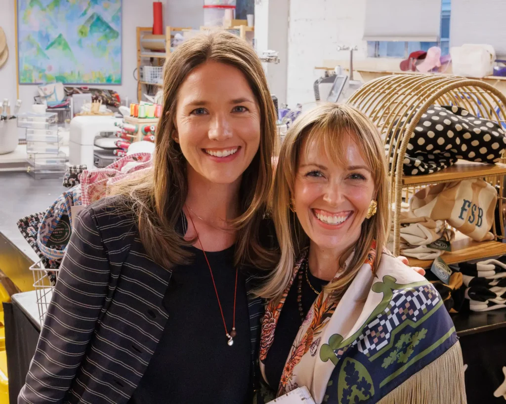 Marion Meythaler and Jen Shoop smiling together at Bluebird & Co in Crozet.